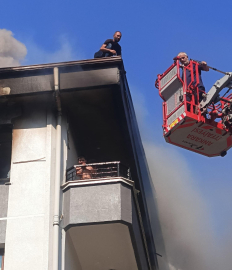 Yangında mahsur kalan çocuk, üzerine su döküp, ıslak bezlerle alevlerden korundu